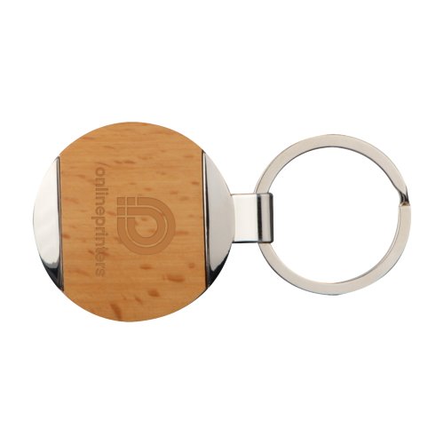 Portachiavi marrone in metallo e legno con motivo e anello metallico.