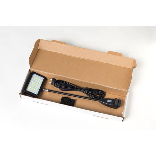 Lampada LED nera con cavo e spina per display.