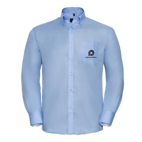 Camicia in cotone azzurro da uomo, senza stiro, con maniche lunghe e abbottonatura.