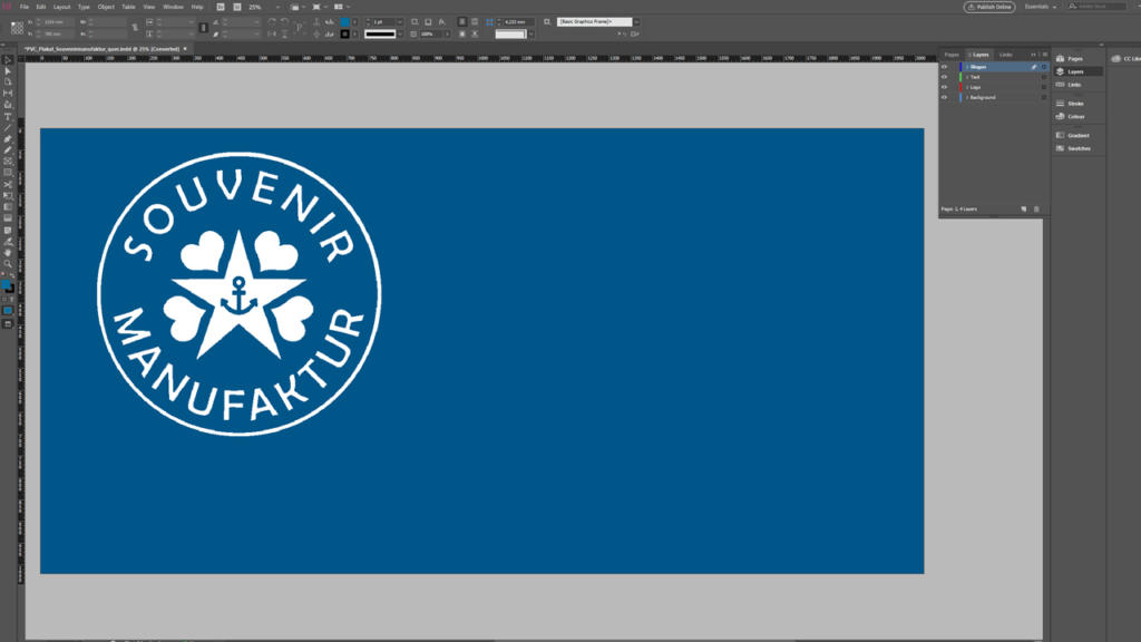 L'interfaccia del software di progettazione grafica blu mostra un logo circolare bianco, circondato dal testo SOUVENIR MANUFAKTUR. Al centro, tre cuori e una freccia sono ben in evidenza, catturando l'attenzione come accattivanti banner pubblicitari.