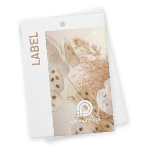 Un'etichetta bianca con un delicato motivo floreale al centro, con delicate foglie traslucide e tenui toni beige. La parola LABEL è scritta verticalmente sul lato. In basso c'è un logo con il testo onlineprinters.